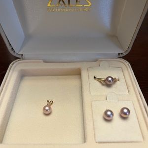 Pink pearl with diamond accents gold ring, earrings and necklace charm.